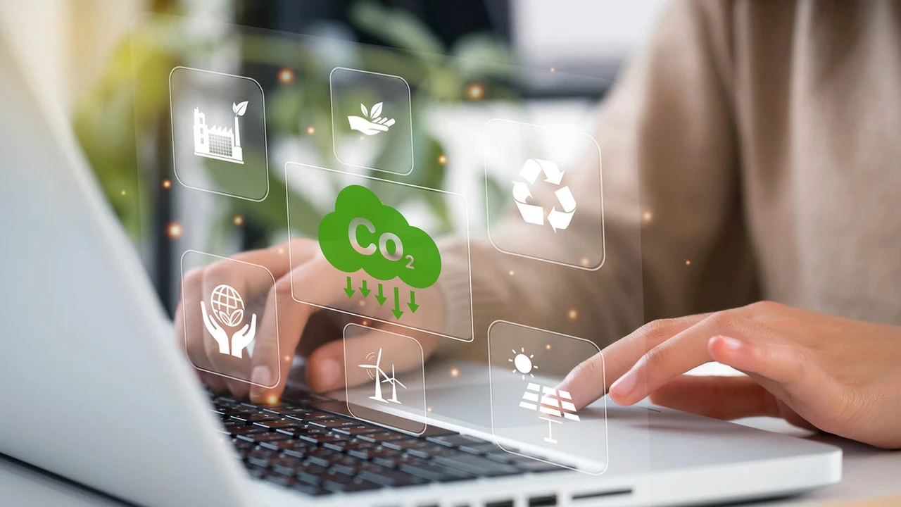 Close up on a plate of mashed potatoes, topped with baked pork chops with cream of mushroom soup, and a side of green beans.