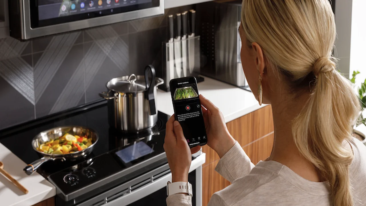 overhead view of corned beef sliced and on a platter with cabbage, potatoes, and carrots