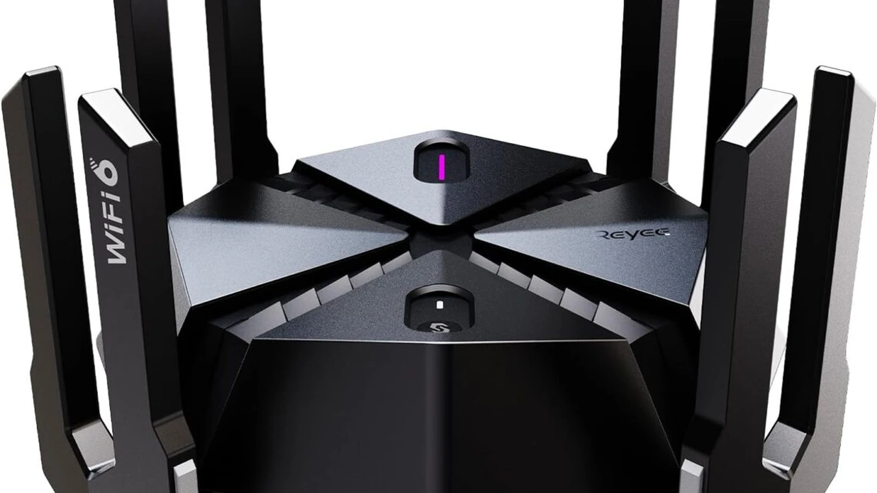 overhead view of corned beef sliced and on a platter with cabbage, potatoes, and carrots