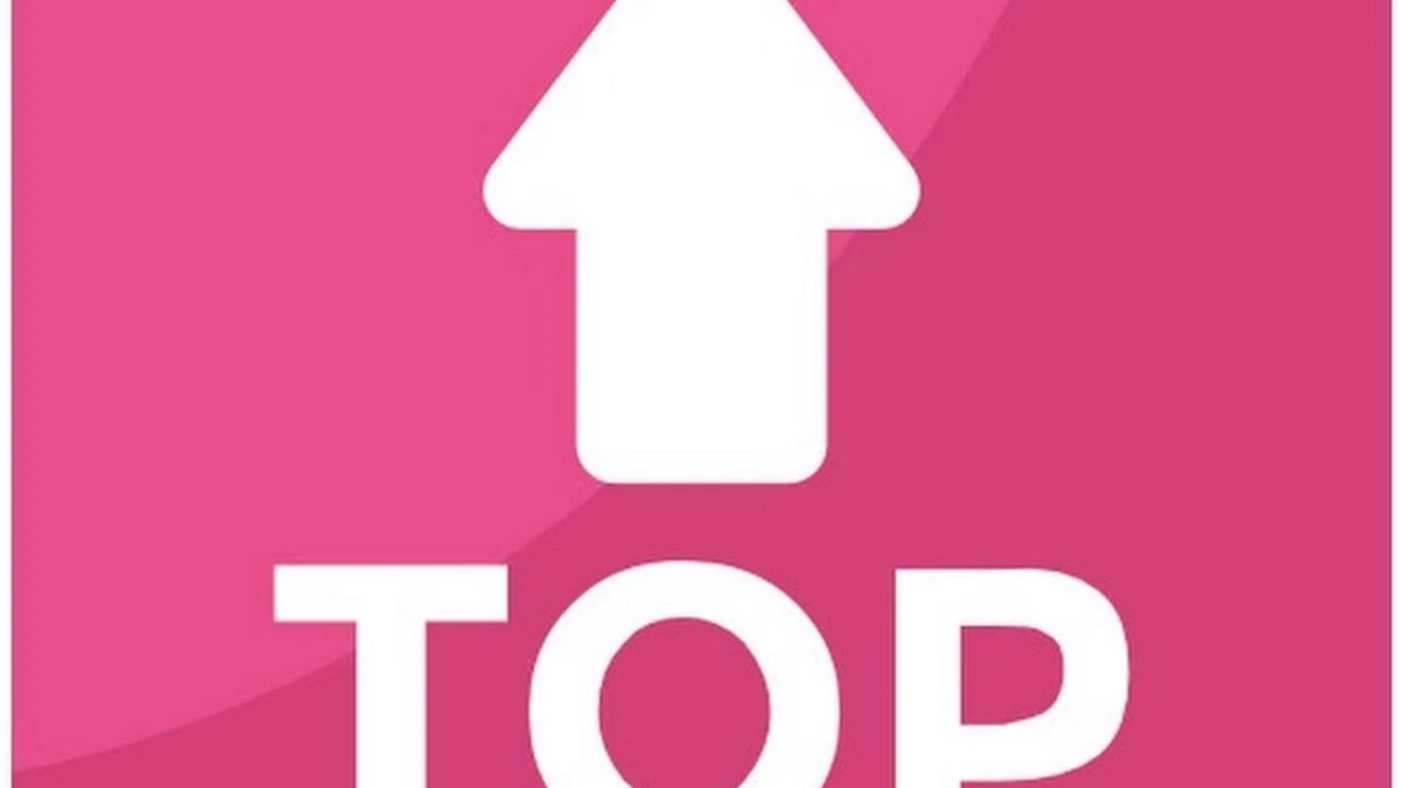 Two mint chocolate milkshakes with whipped cream and green sprinkles.