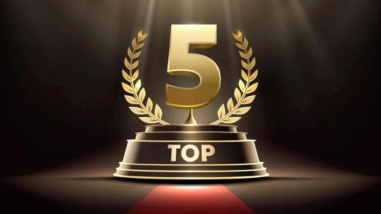 Close up on a plate of mashed potatoes, topped with baked pork chops with cream of mushroom soup, and a side of green beans.